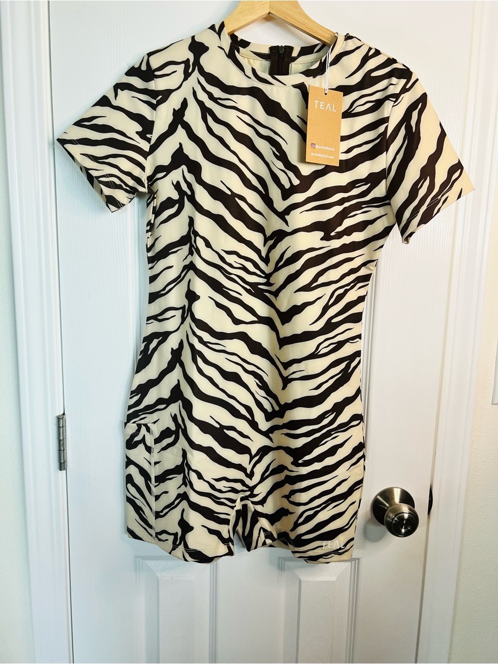 Zebra Print Short Sleeve Romper - Black & Cream